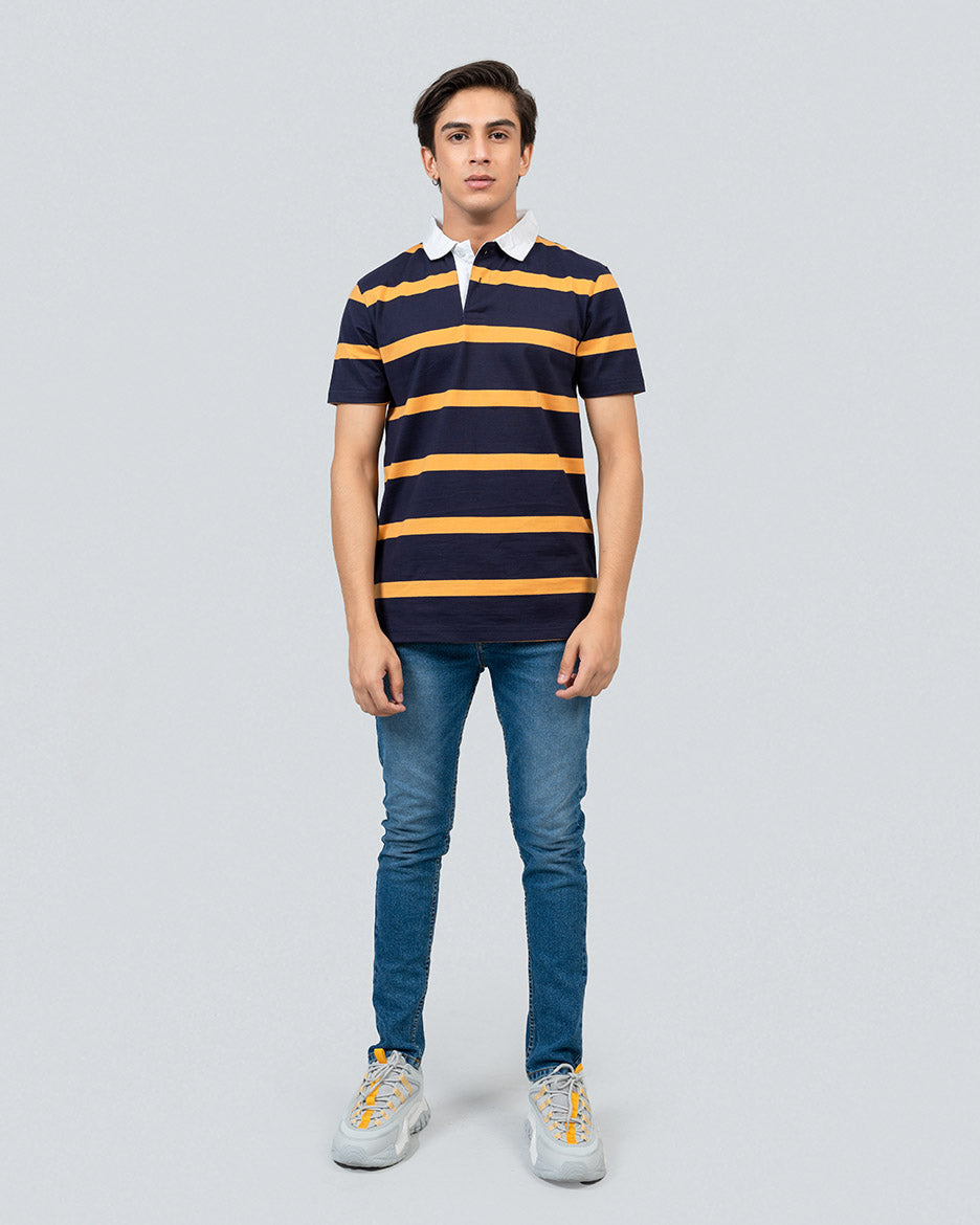 model wearing overtop stripe blue and yellow collared polo shirt