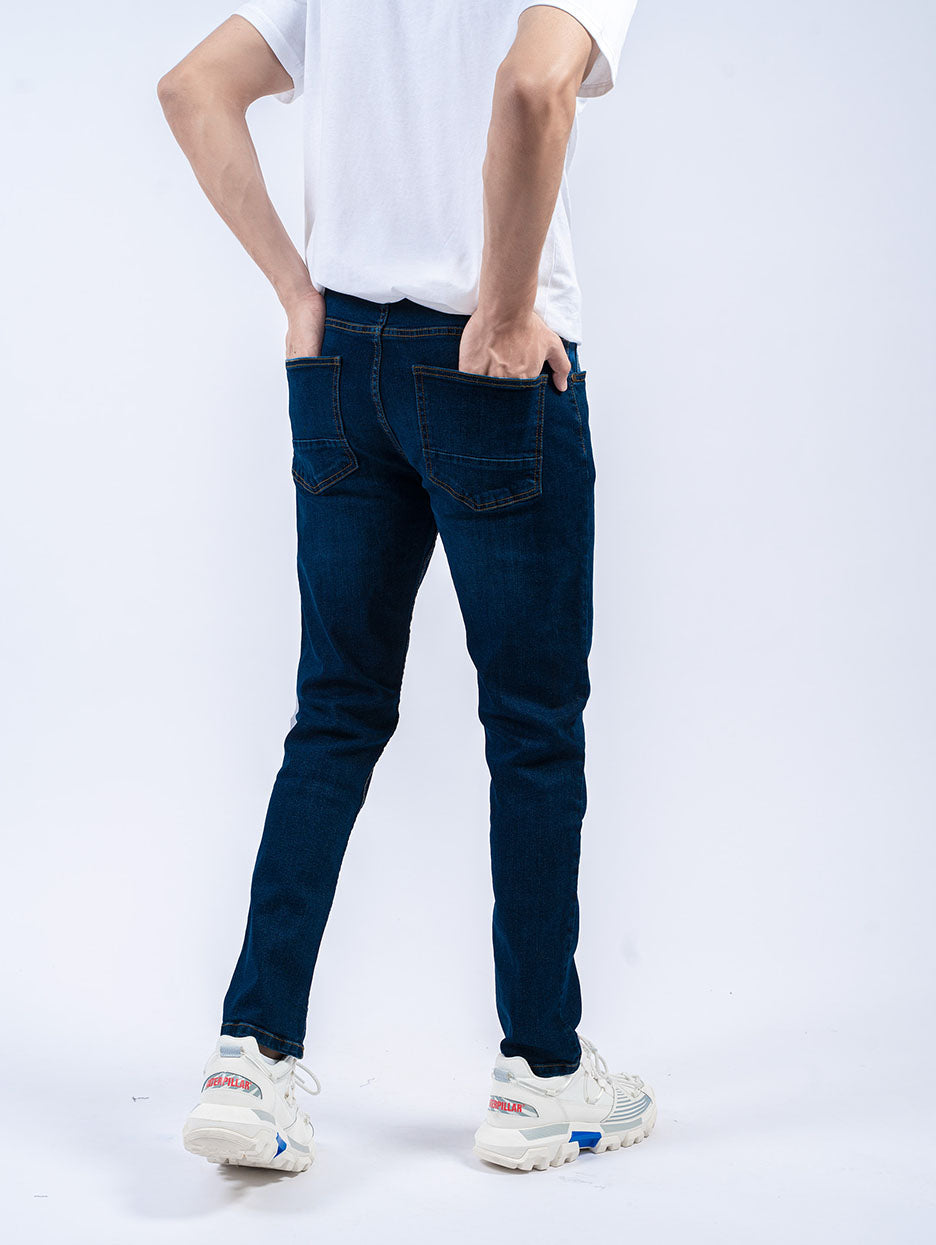 back of dark blue skinny jeans for men